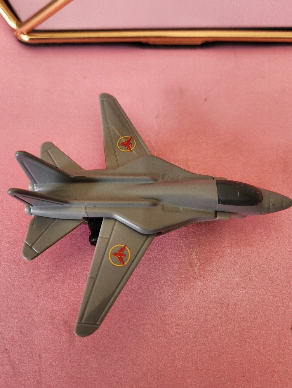 2019 Mattel Gray Military Jet Toy Plane with Red-Yellow Roundels